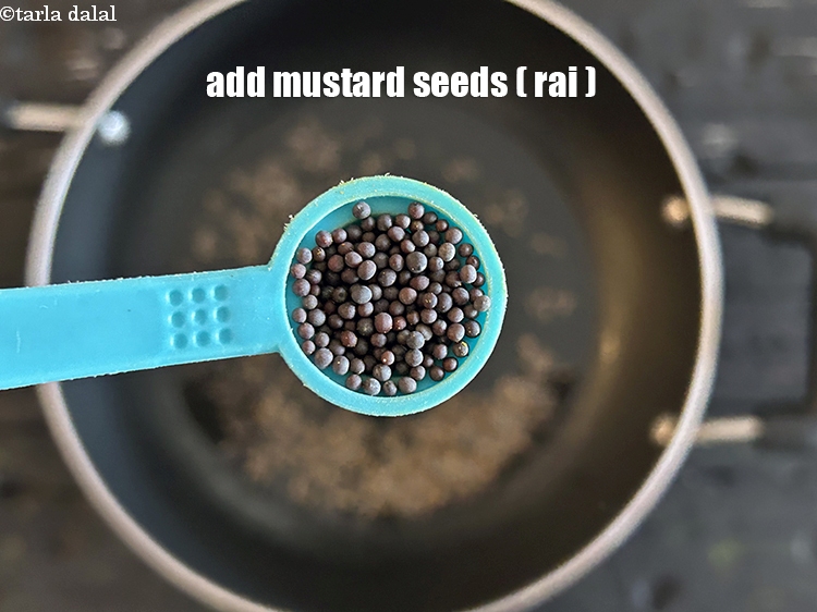 Step 11 – Add&nbsp;<meta charset="UTF-8" />1/2 tsp&nbsp;<a href="glossary-mustard-seeds-sarson-rai-sarson-ke-beej-525i">mustard seeds ( rai / sarson)</a>.