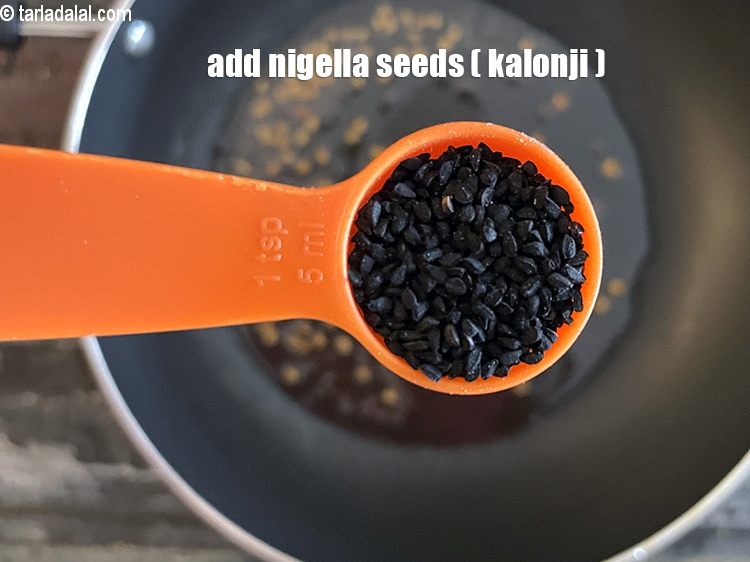 Step 11 – Add&nbsp;<meta charset="UTF-8" />1 tsp&nbsp;<a href="glossary-nigella-seeds-kalonji-onion-seeds-552i">nigella seeds (kalonji)</a>.