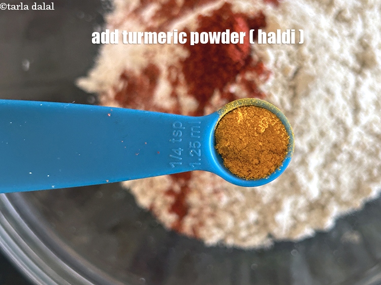 Step 7 – Add&nbsp;<meta charset="UTF-8" />a pinch of&nbsp;<a href="glossary-turmeric-powder-haldi-645i">turmeric powder (haldi)</a>.