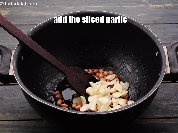 Step 6 – Add the <a href="https://www.tarladalal.com/glossary-garlic-lehsun-lahsun-348i#ing_773" target="_blank">sliced garlic</a>. You can also use crushed garlic if you wish …