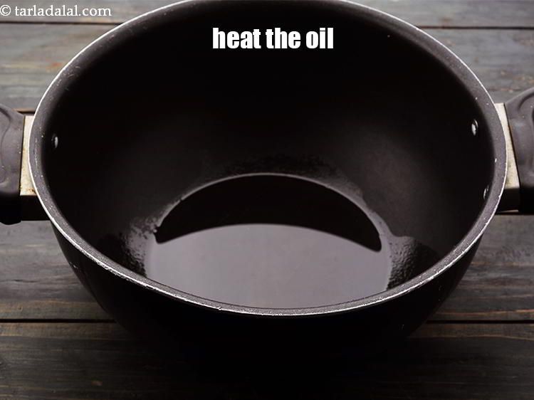 Step 5 – To make <strong>bhadang recipe | spicy puffed rice chivda | Indian bhadang</strong>, heat the <a …