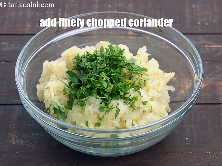 Step 8 – Add 1 tbsp&nbsp;finely&nbsp;<a href="https://tarladalal.com/glossary-chopped-coriander-783i">chopped coriander (dhania)</a>.&nbsp;