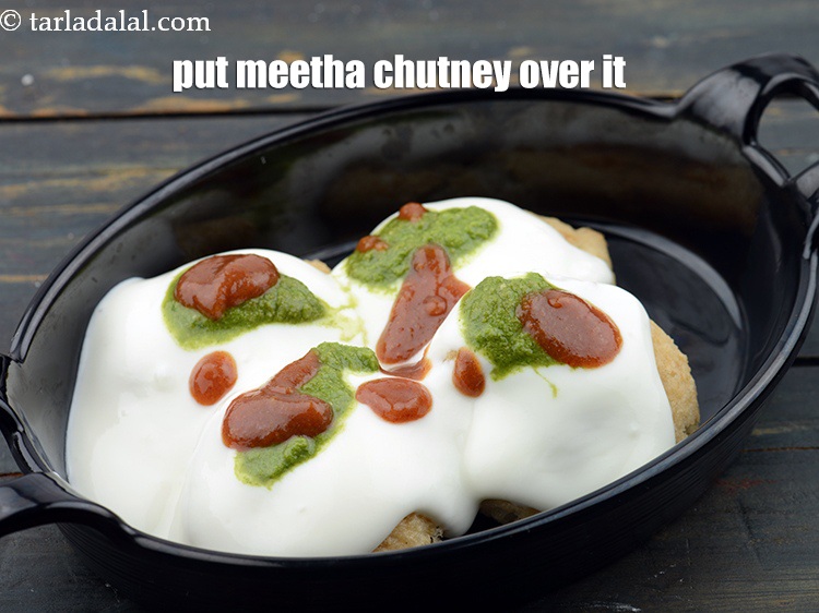 Step 66 – Put 1 tbsp <a href="https://www.tarladalal.com/meetha-chutney-22265r">meetha chutney</a>.&nbsp;