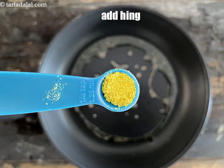 Step 12 – Add&nbsp;<meta charset="UTF-8" />1/4 tsp&nbsp;<a href="glossary-asafoetida-hing-113i">asafoetida (hing)</a>.