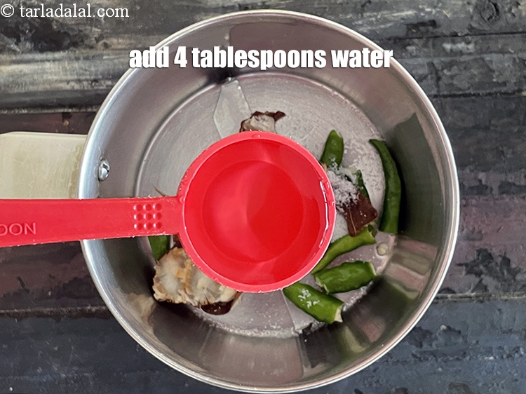 Step 6 – Add 4&nbsp;tbsp of water.