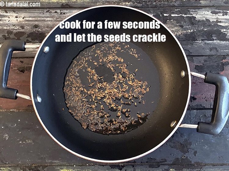 Step 15 – Cook for a few seconds and let the seeds crackle.
