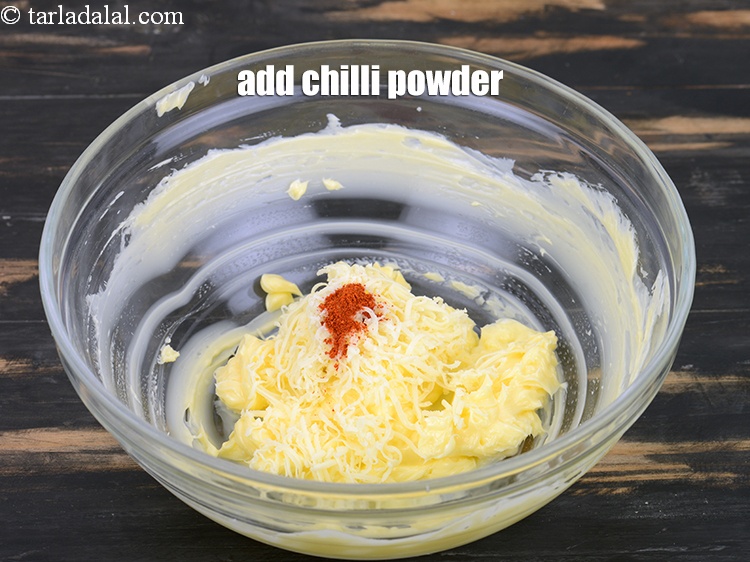 Step 6 – Add a pinch of <a href="https://www.tarladalal.com/glossary-chilli-powder-red-chilli-powder-339i">chilli powder</a>.