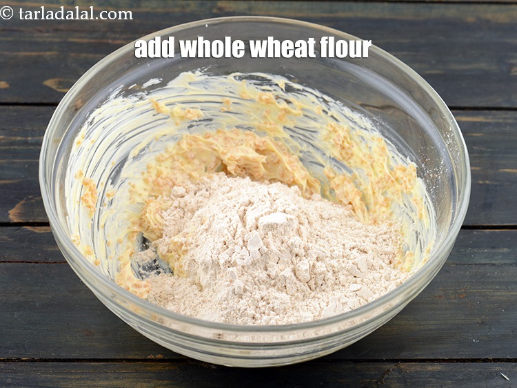 Step 6 – Add 1/2 cup&nbsp;<a href="https://www.tarladalal.com/glossary-whole-wheat-flour-gehun-ka-atta-gehun-ka-aata-429i">whole wheat flour (gehun ka atta)</a>.