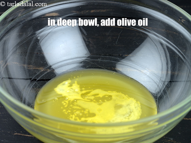 Step 6 – In a deep bowl, add 2 tbsp olive oil.