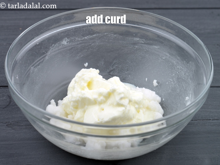 Step 6 – Add &frac12; cup <a href="https://www.tarladalal.com/glossary-curd-dahi-yogurt-yoghurt-383i">curd (dahi)</a>.