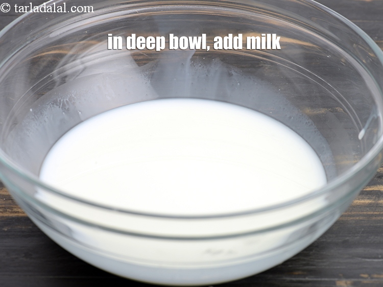 Step 6 – In a deep bowl, add 1 cup <a href="https://www.tarladalal.com/glossary-milk-doodh-full-cream-milk-514i">milk</a>.