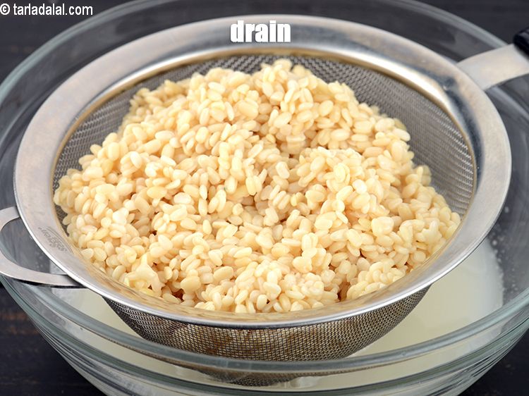 Step 6 – Drain the urad dal.