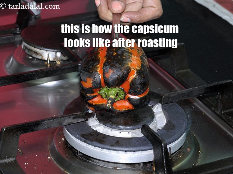 Step 6 – This is how the capsicum looks like after roasting. The skin will turn black in …