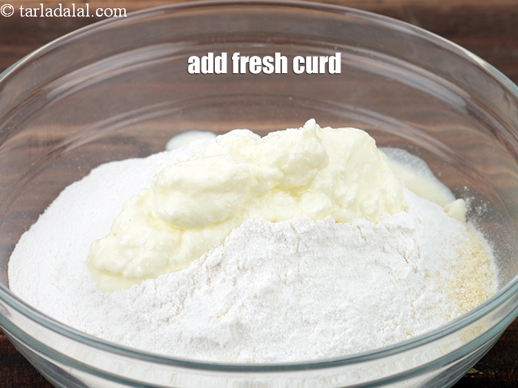 Step 6 – Add 2 tbsp fresh <a href="https://www.tarladalal.com/glossary-curd-dahi-yogurt-yoghurt-383i">curd (dahi)</a>.