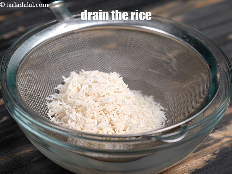 Step 7 – Drain the rice and keep aside.&nbsp;