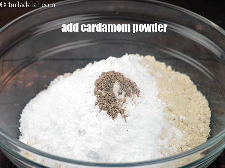 Step 6 – Add 1/4 tsp <a href="https://www.tarladalal.com/glossary-cardamom-powder-elaichi-powder-265i">cardamom (elaichi) powder</a>.