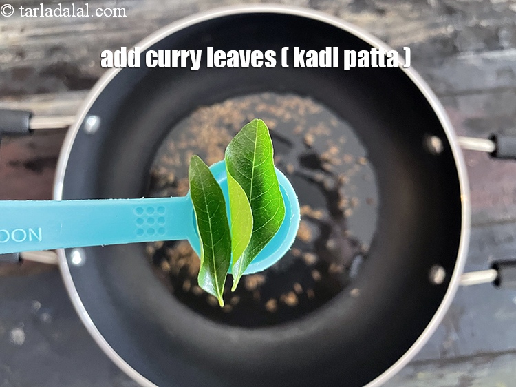 Step 7 – Add&nbsp;<meta charset="UTF-8" />2&nbsp;<a href="glossary-curry-leaves-kadi-patta-kadipatta-388i">curry leaves (kadi patta)</a>.