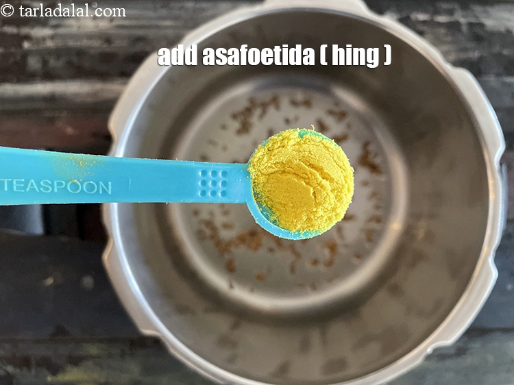 Step 15 – Add&nbsp;<meta charset="UTF-8" />1/2 tsp&nbsp;<a href="glossary-asafoetida-hing-113i">asafoetida (hing)</a>.