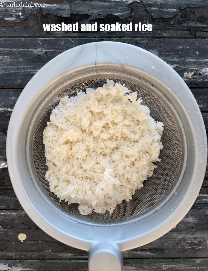 Step 8 – Drain. You have washed and soaked rice.