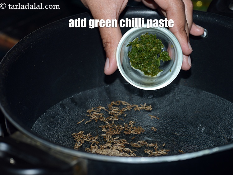 Step 6 – Add 1 tsp <a href="https://www.tarladalal.com/glossary-ginger-green-chilli-paste-adrak-mirch-ki-paste-adrak-mirchi-paste-139i">green chilli paste</a>.