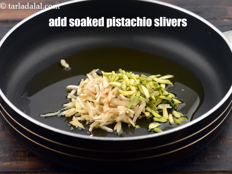 Step 6 – Add 2 tbsp&nbsp;soaked&nbsp;<a href="https://www.tarladalal.com/glossary-pistachio-slivers-894i">pistachio slivers</a>.