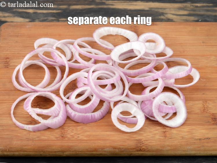 Step 6 – Separate each ring. We need 1 &frac12; cups of <a href="https://www.tarladalal.com/glossary-onion-rings-987i">onion rings</a>.