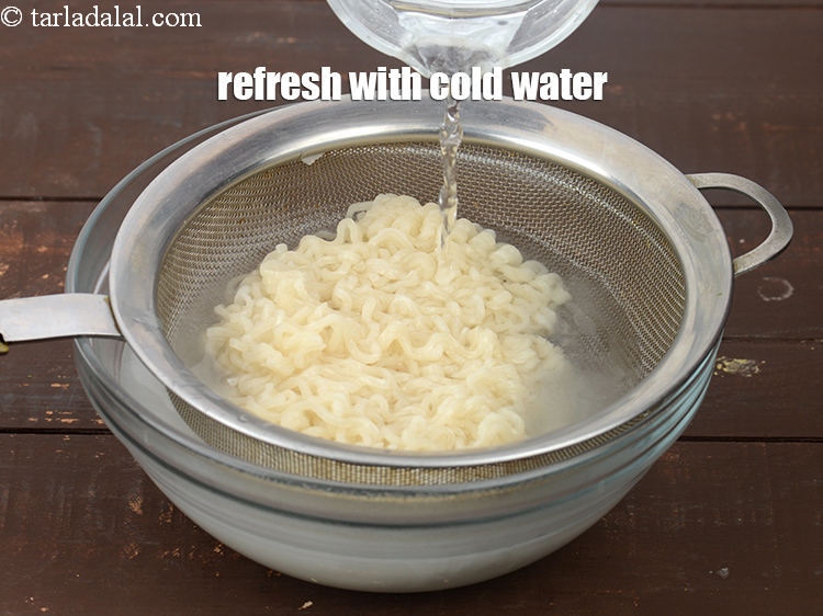 Step 28 – It&rsquo;s very important to refresh the noodles with cold water.&nbsp;