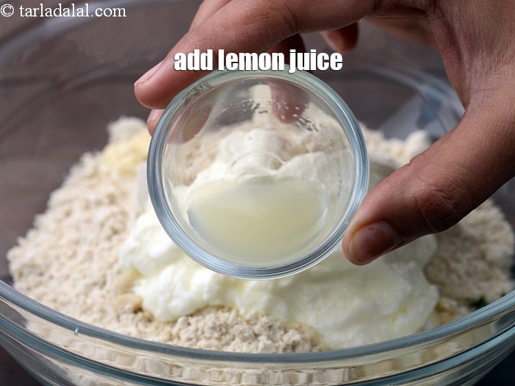 Step 6 – Add 1 tsp <a href="https://www.tarladalal.com/glossary-lemon-juice-numbi-ka-ras-nimbu-ka-juice-471i">lemon juice</a>, To add a hint of tanginess to muthias.