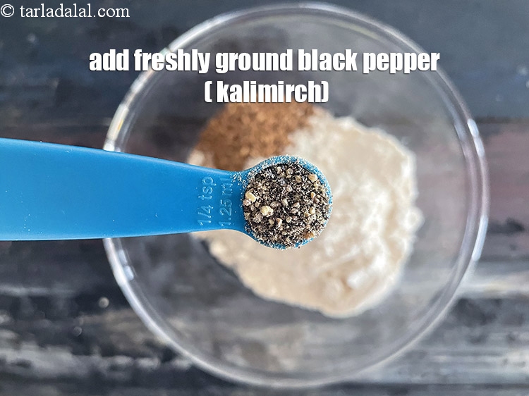Step 7 – Add&nbsp;1/4 tsp&nbsp;freshly ground&nbsp;<a href="https://tarladalal.com/glossary-black-peppercorns-kali-mirch-kalimirch-566i">black peppercorns (kalimirch)</a>.
