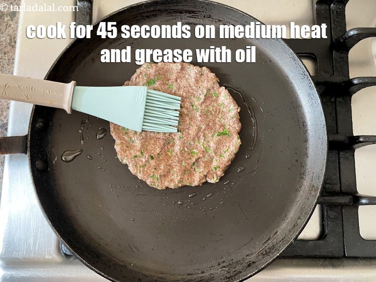 Step 19 – Cook for 45 seconds on medium heat and then grease the top with oil.