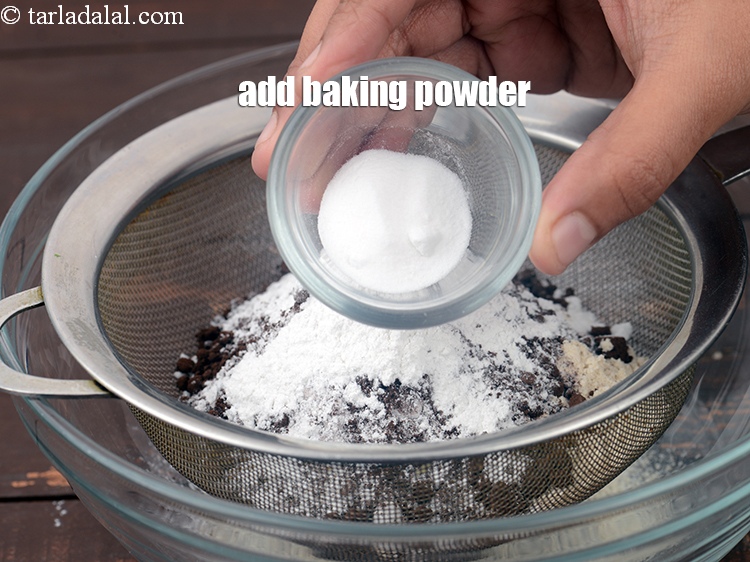 Step 6 – Add 1 tsp <a href="https://www.tarladalal.com/glossary-baking-powder-425i">baking powder</a>.