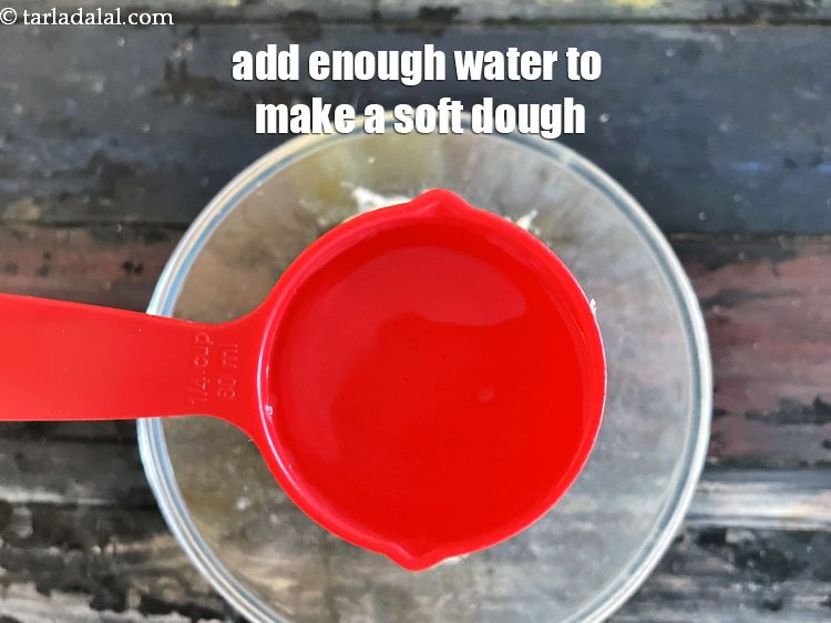 Step 9 – Add enough water to make a soft dough. We added 1/4 cup water.