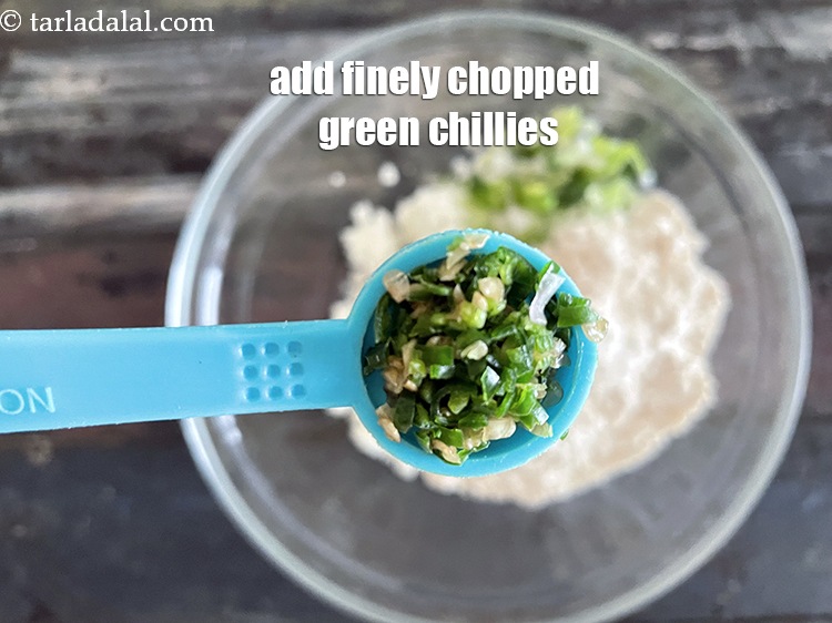 Step 8 – Add&nbsp;<meta charset="UTF-8" />1/2 tsp &nbsp;finely chopped green chillies or&nbsp;<a href="glossary-green-chilli-paste-hari-mirch-ki-paste-mirchi-paste-333i">green chilli paste</a>.