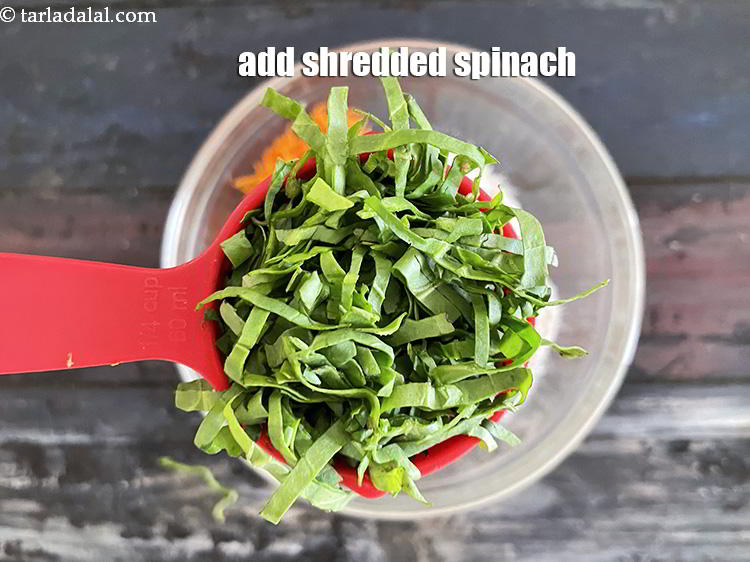 Step 6 – Add&nbsp;<meta charset="UTF-8" />1/4 cup&nbsp;<a href="glossary-shredded-spinach-777i">shredded spinach (palak)</a>.