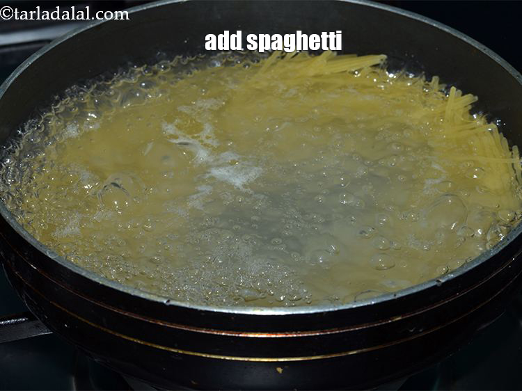 Step 6 – Add the spaghetti to the boiling water and stir once.