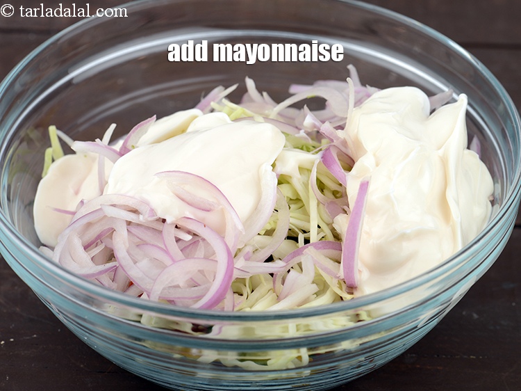 Step 6 – Add &frac12; cup&nbsp;<a href="https://www.tarladalal.com/glossary-mayonnaise-505i">mayonnaise</a>.