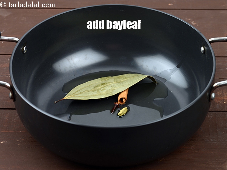 Step 8 – Add 1 <a href="https://www.tarladalal.com/glossary-bay-leaf-tejpatta-bay-leaves-189i">bayleaf (tejpatta)</a>.