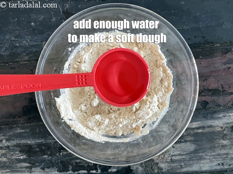 Step 13 – Add enough water to make a soft dough. We added 3 1/2 tablespoons water.