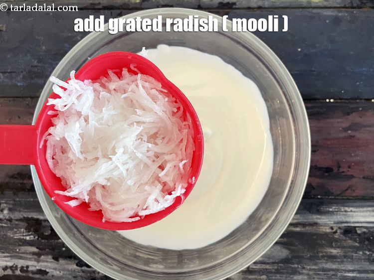 Step 11 – Add&nbsp;3/4 cup&nbsp;<a href="https://tarladalal.com/glossary-grated-radish-953i">grated radish (mooli)</a>.