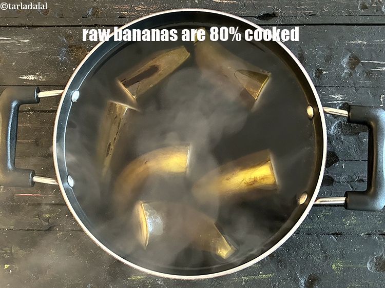 Step 31 – Raw bananas are 80% cooked.