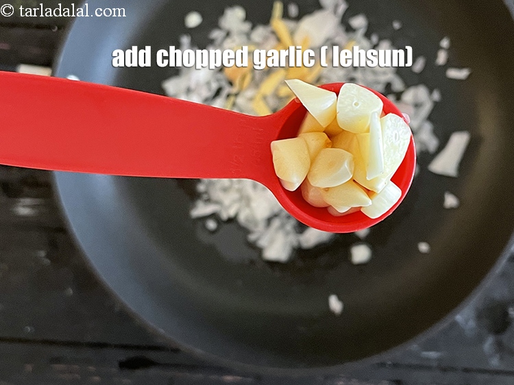 Step 35 – Add&nbsp;1/2 tablespoon chopped garlic.