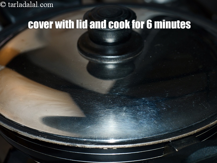 Step 6 – Cover with a lid and cook on a medium flame for 6 minutes, while stirring …