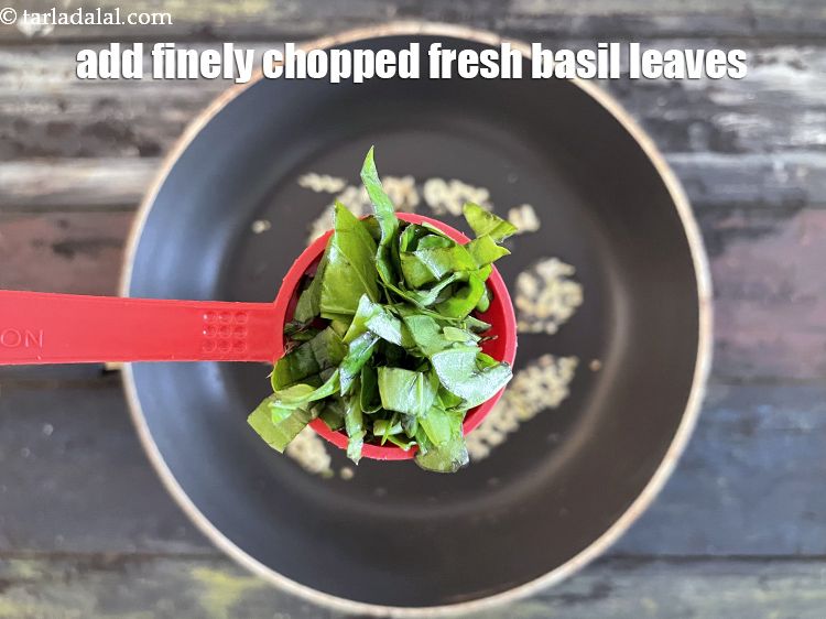 Step 12 – Add&nbsp;1 tbsp&nbsp;finely&nbsp;<a href="glossary-chopped-basil-804i">chopped fresh basil leaves</a>.