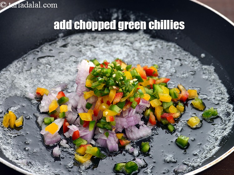 Step 6 – Add 1 tsp&nbsp;<a href="https://www.tarladalal.com/glossary-chopped-green-chilli-820i">chopped green chillies</a>.