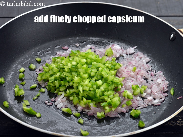 Step 6 – Add 1/4 cup&nbsp;finely&nbsp;<a href="https://www.tarladalal.com/glossary-chopped-capsicum-164i">chopped capsicum</a>.