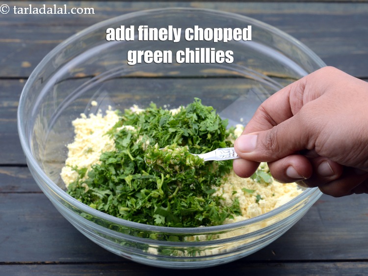 Step 7 – Add 1/2 tsp finely <a href="https://www.tarladalal.com/glossary-chopped-green-chilli-820i">chopped green chillies</a>.