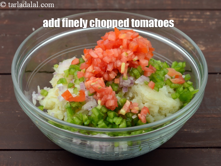 Step 6 – Add 1/4 cup&nbsp;finely&nbsp;<a href="https://tarladalal.com/glossary-chopped-tomatoes-779i">chopped tomatoes</a>.&nbsp;