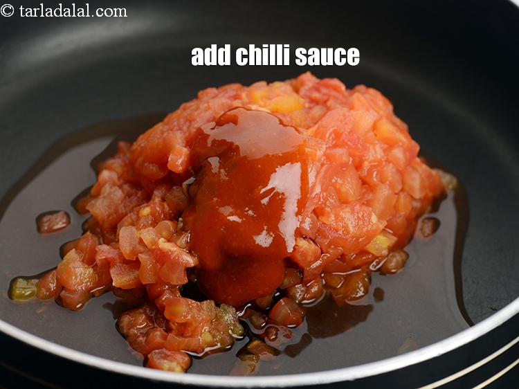 Step 6 – Add 2 tsp chilli sauce.