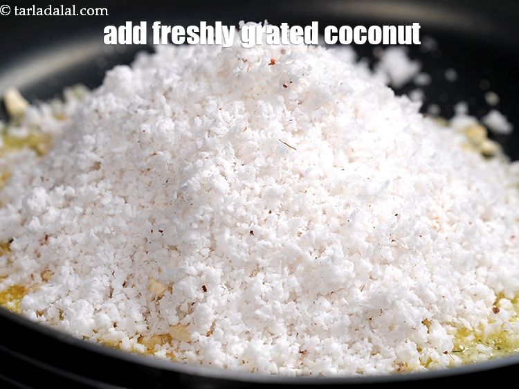 Step 6 – Add 1 cup&nbsp;freshly&nbsp;<a href="https://www.tarladalal.com/glossary-grated-coconut-852i">grated coconut</a>. It should be freshly grated.&nbsp;