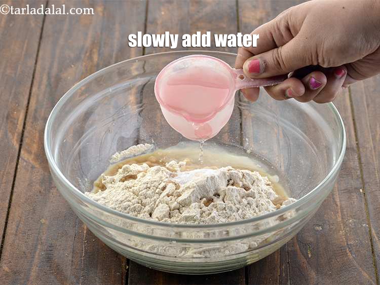 Step 13 – Gradually add&nbsp;enough water to make a soft dough. We added 1/3 rd cup&nbsp;water. Then we …